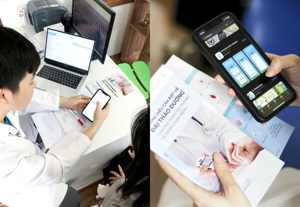 베트남 하노이의대병원에서 의료진이 KT의 비대면 케어 서비스 앱 ‘닥터어라운드’ 사용법을 환자들에게 설명하고 있다 [사진 : KT] 